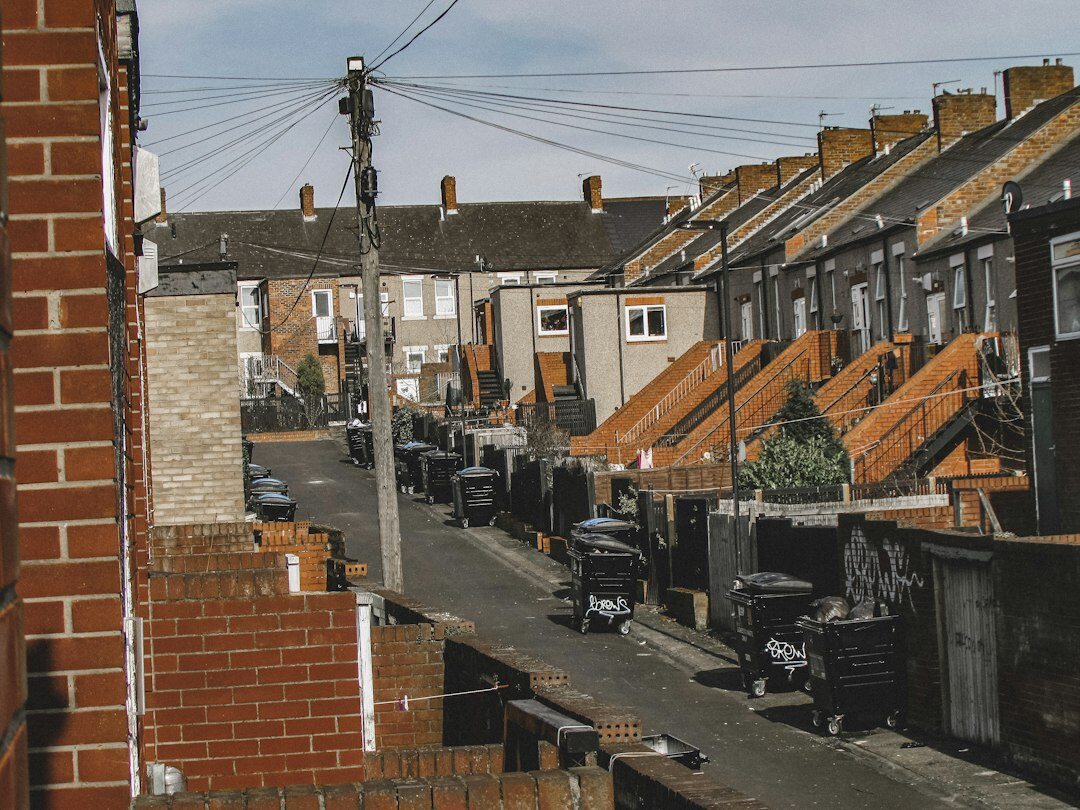 Documentary photographer talking with residents in a Danish neighbourhood