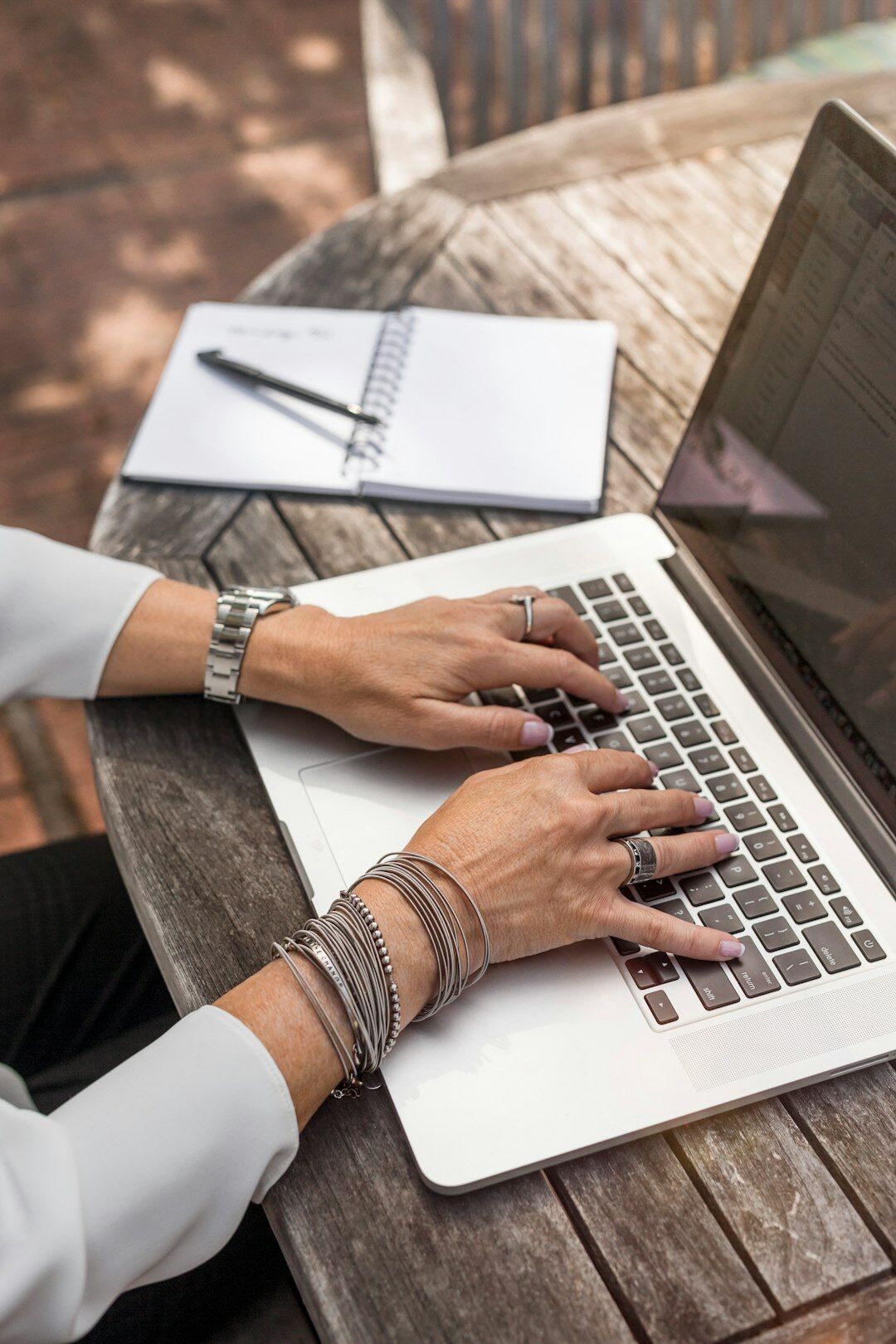 person using laptop for insurance